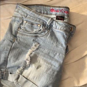 Ripped high wasted blue jean shorts